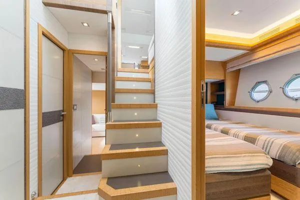  Yacht Photos Pics Luxurious interior of 2018 Monte Carlo Yachts MCY 70 with modern design and elegant staircase.