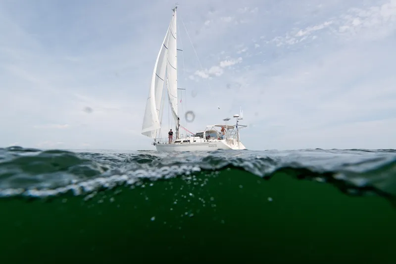 Boojum Yacht Photos Pics Sailboat Outbound 46 (2024) on open sea, viewed from water level.