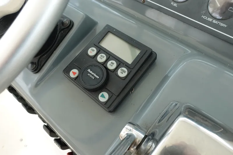  Yacht Photos Pics Control panel of a 1997 Pursuit 3400 Offshore boat with Robertson AP300X autopilot.