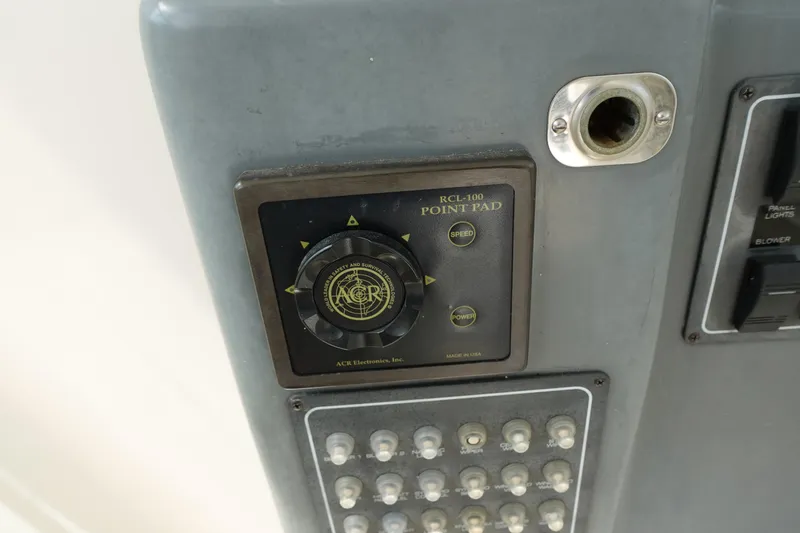  Yacht Photos Pics Control panel of a 1997 Pursuit 3400 Offshore boat with RCL-100 point pad.