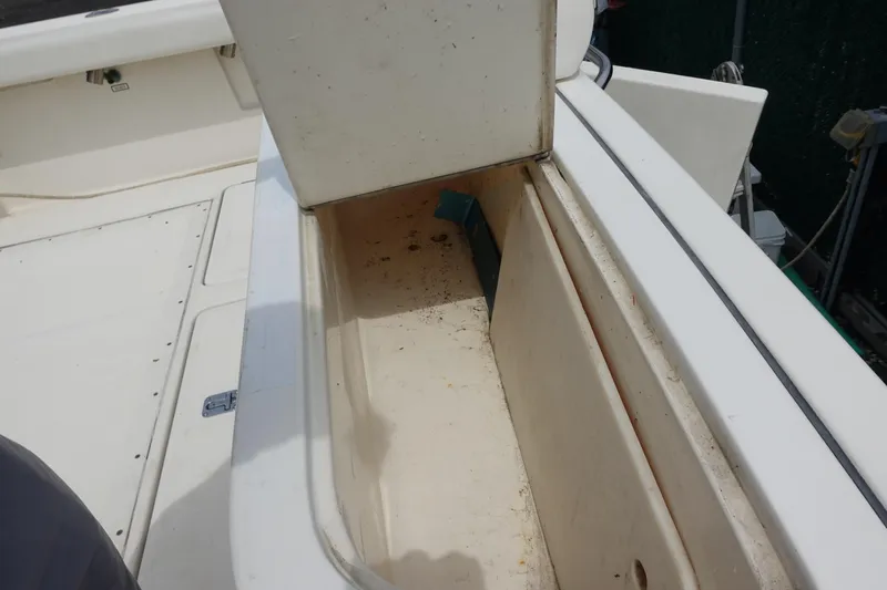  Yacht Photos Pics Open storage compartment on a 1997 Pursuit 3400 Offshore boat.