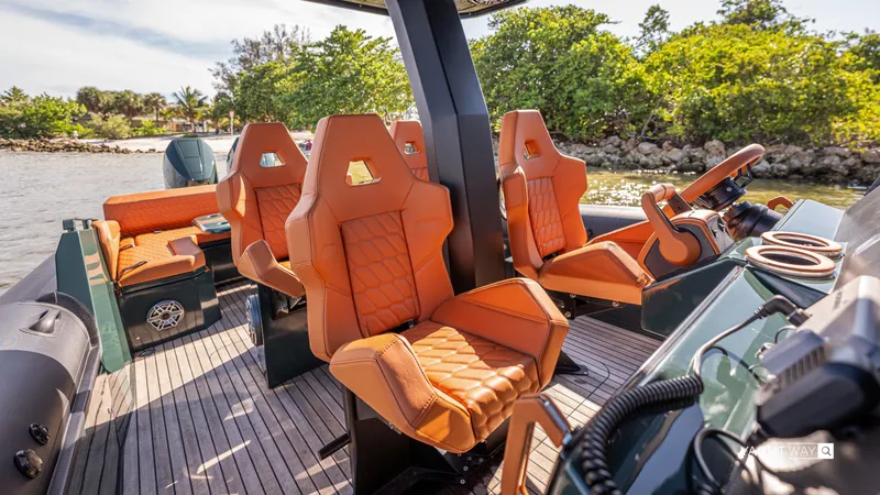 New 2025 Skipper 38 Twin 400 V10 Yacht Photos Pics Luxurious 2025 Skipper-BSK 38 boat interior with orange leather seats and modern dashboard.