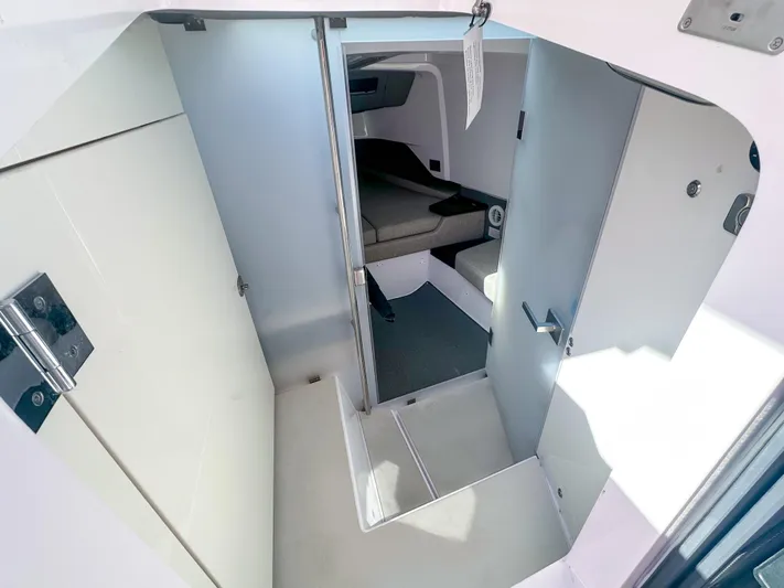  Yacht Photos Pics 2024 Axopar 37XC CROSS CABIN interior with modern design and comfortable seating.