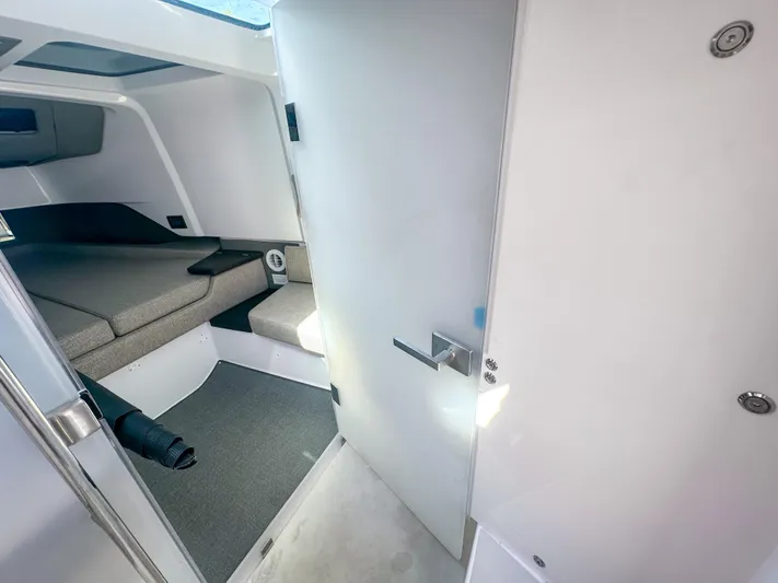  Yacht Photos Pics 2024 Axopar 37XC CROSS CABIN interior with modern design and comfortable seating.