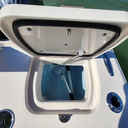 Liquid Asset Yacht Photos Pics Open storage compartment on a 2022 Grady-White 326 CANYON boat.