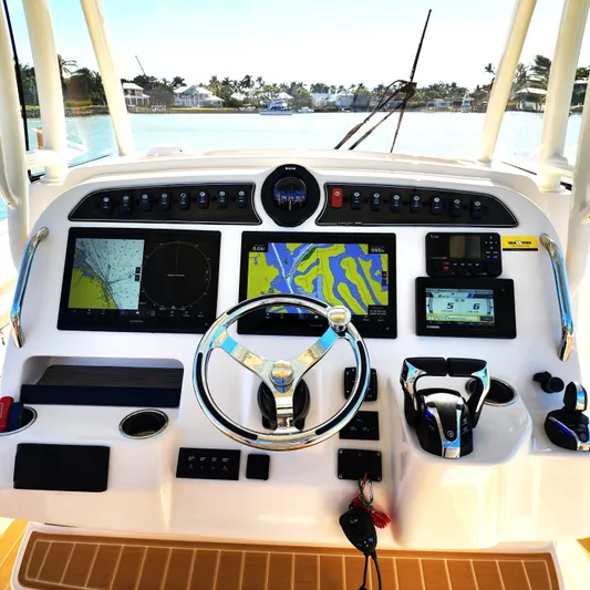 Liquid Asset Yacht Photos Pics 2022 Grady-White 326 CANYON boat dashboard with advanced navigation and control systems.