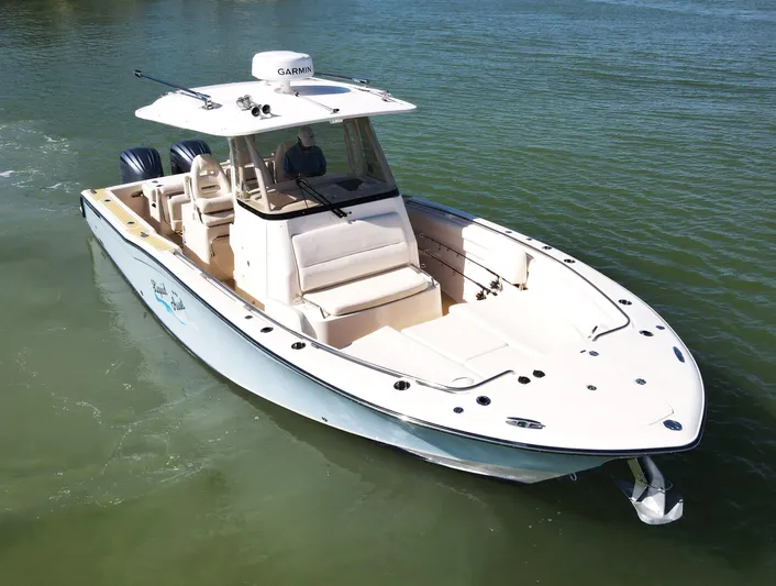 Liquid Asset Yacht Photos Pics 2022 Grady-White 326 CANYON boat cruising on water.