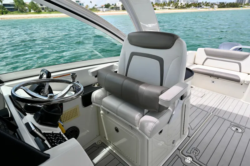  Yacht Photos Pics Helm of 2018 World Cat 320 DC boat with luxurious seating and ocean view.