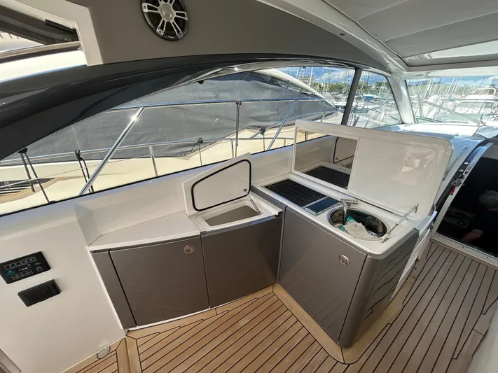  Yacht Photos Pics Luxury yacht Princess V50 2020 model with sleek outdoor kitchen and modern design.