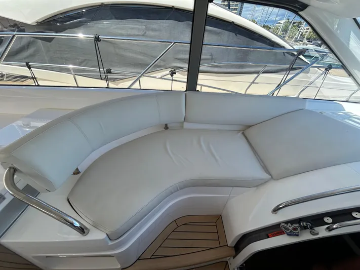  Yacht Photos Pics Luxurious seating area on a 2020 Princess V50 yacht with sleek design.