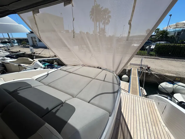  Yacht Photos Pics Luxurious 2020 Princess V50 yacht with sunshade and spacious deck at marina.