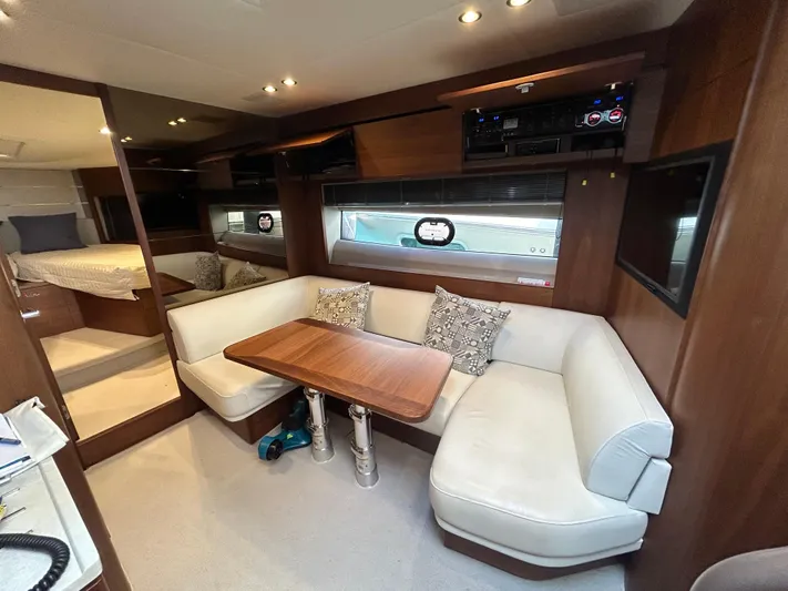  Yacht Photos Pics Luxurious 2020 Princess V50 yacht interior with elegant seating and dining area.