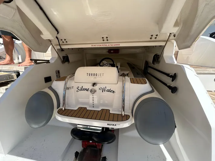  Yacht Photos Pics 2020 Princess V50 yacht garage with Turbojet 285 tender stored inside.