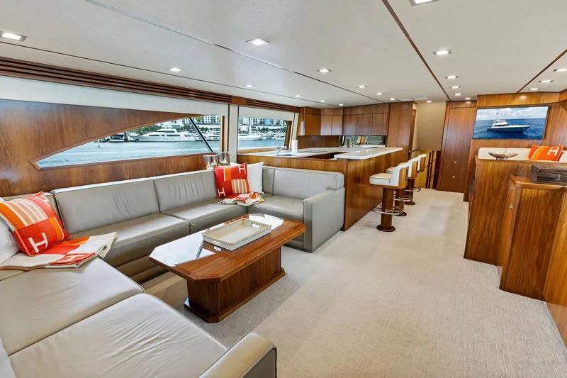  Yacht Photos Pics Luxurious interior of 2018 Viking 80 Convertible yacht with elegant seating and modern decor.