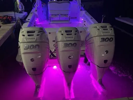  Yacht Photos Pics 2006 Hydra-Sports 33 Vx boat with triple 300 Verado engines and purple underwater lights.