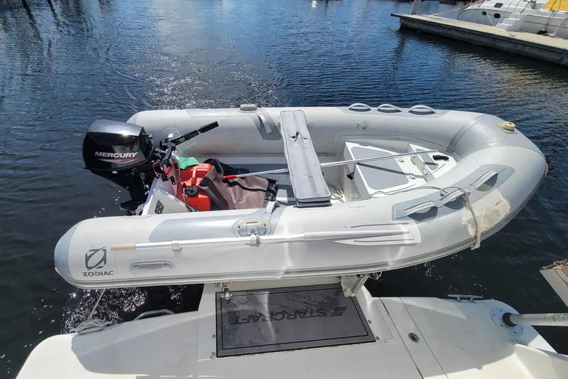 'perrydise' Yacht Photos Pics Inflatable Zodiac boat with Mercury motor on 2007 Meridian 341 Sedan