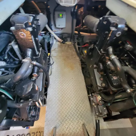 'perrydise' Yacht Photos Pics Engine room of a 2007 Meridian 341 Sedan with visible machinery and components.