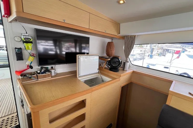 Mocean Yacht Photos Pics Interior of 2017 Lagoon 42 yacht with modern amenities and large window view.