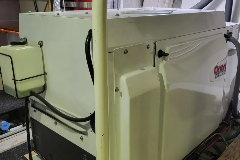 Savoy Yacht Photos Pics 1970 Chris-Craft Commander engine room with Onan generator.