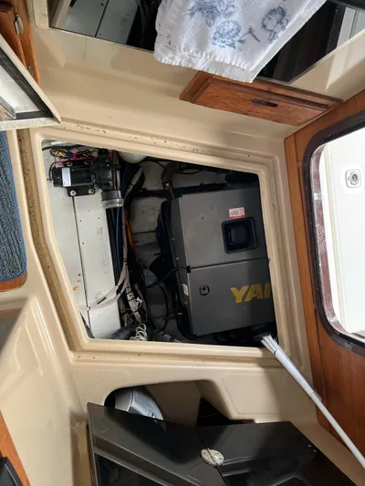  Yacht Photos Pics Engine compartment of 2012 Ranger Tugs R-29 boat, showcasing mechanical components.