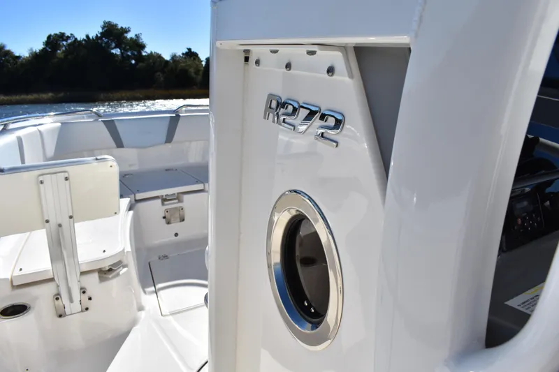  Yacht Photos Pics 2022 Robalo R272 Center Console boat interior with sleek design and modern features.