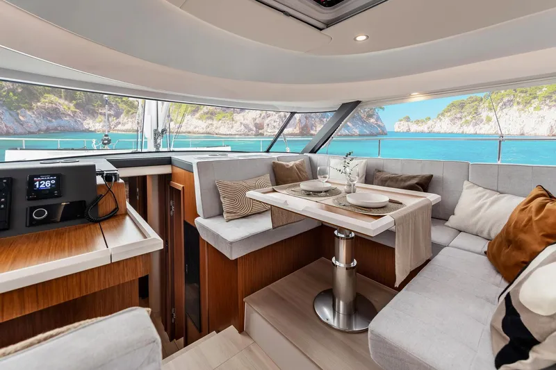  Yacht Photos Pics Luxurious interior of 2026 Moody 48DS yacht with scenic ocean view.