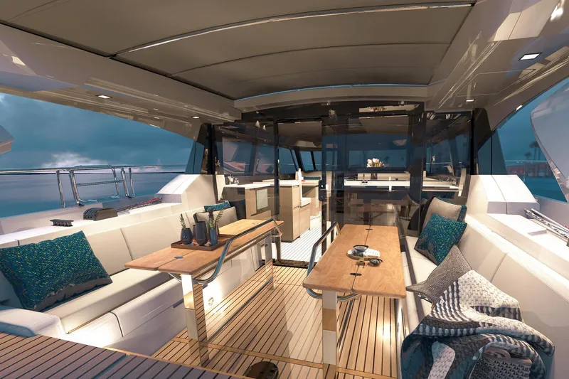  Yacht Photos Pics Luxurious interior of 2026 Moody 48DS yacht with elegant seating and wooden tables.