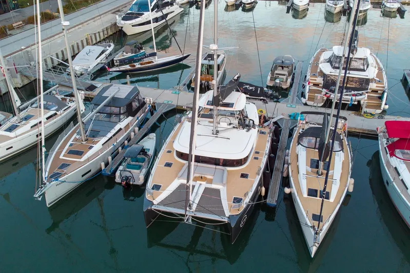  Yacht Photos Pics Aerial view of Moody 48DS yachts docked in a marina, 2026 model.