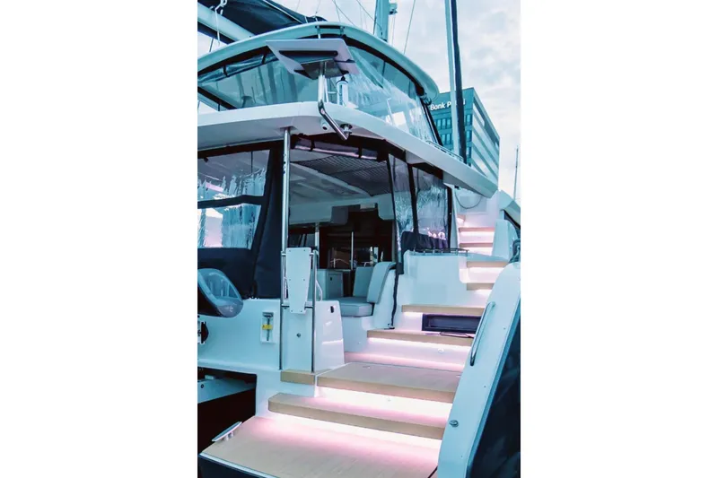  Yacht Photos Pics Luxurious 2026 Moody 48DS yacht with illuminated steps and modern design.