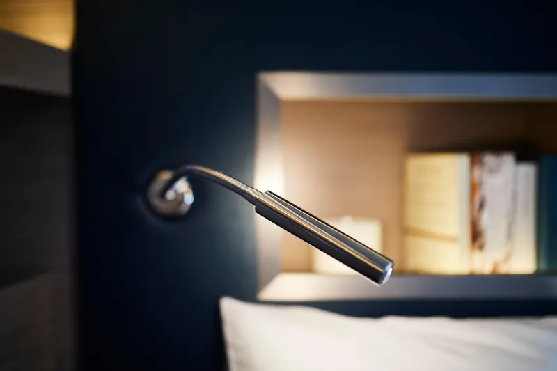  Yacht Photos Pics Flexible reading light in a modern Moody 48DS yacht interior, 2026 model.