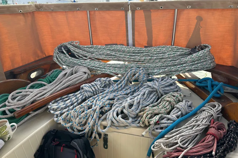 Solimar Yacht Photos Pics Coiled ropes on a 2000 Sam L. Morse Bristol Channel Cutter 28 sailboat deck.