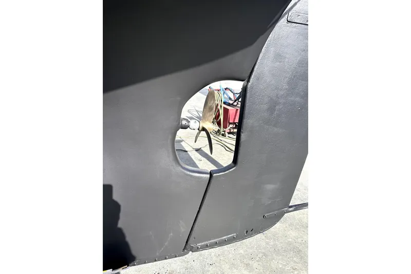Solimar Yacht Photos Pics Close-up of a 2000 Sam L. Morse Bristol Channel Cutter 28 rudder and propeller.