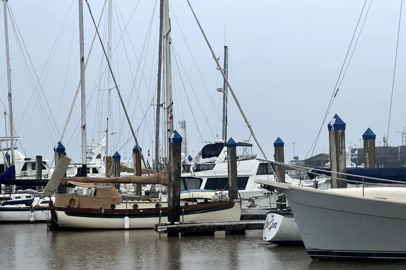 Solimar Yacht Photos Pics Sailboats docked at marina, featuring a 2000 Sam L. Morse Bristol Channel Cutter 28.