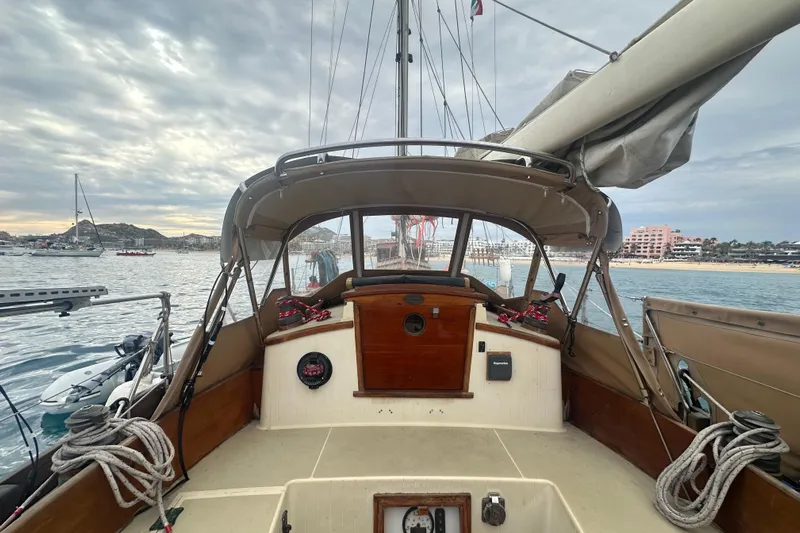 Solimar Yacht Photos Pics Cockpit view of 2000 Sam L. Morse Bristol Channel Cutter 28 sailboat in marina.