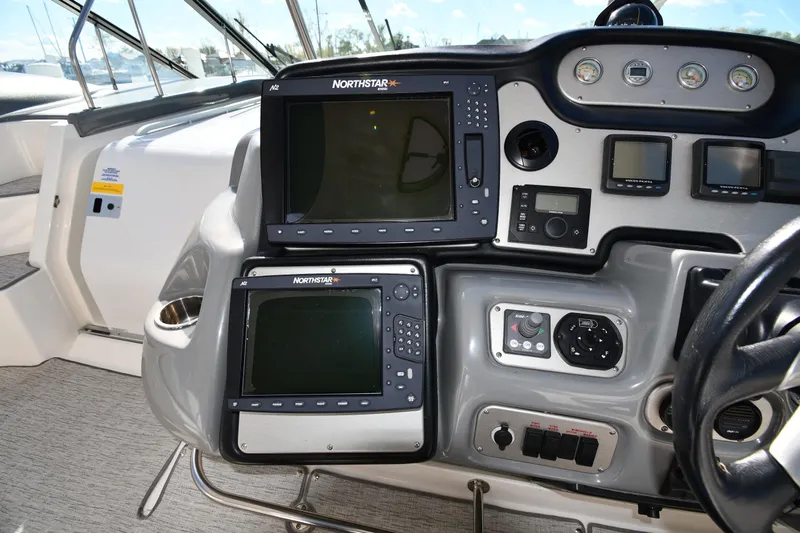  Yacht Photos Pics 2005 Cruisers Yachts 500 Express dashboard with navigation and control panels.
