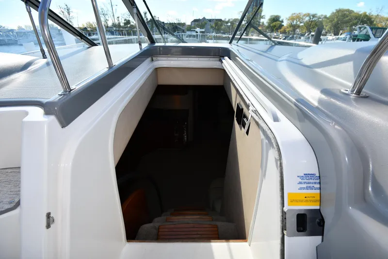  Yacht Photos Pics 2005 Cruisers Yachts 500 Express cabin entrance with stairs and sleek design.