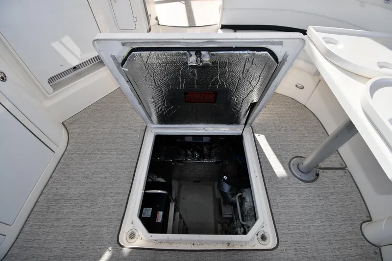  Yacht Photos Pics Engine compartment of 2005 Cruisers Yachts 500 Express, open hatch view.