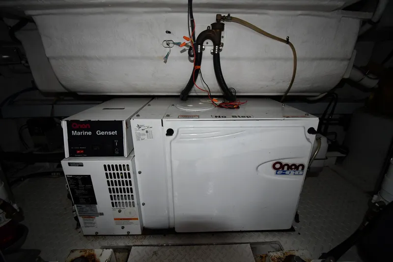  Yacht Photos Pics Onan marine generator in 2005 Cruisers Yachts 500 Express engine room.