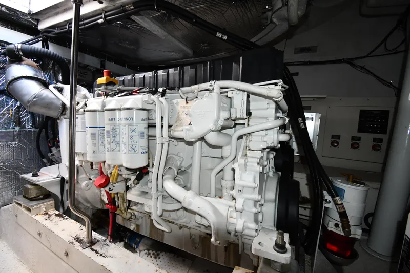  Yacht Photos Pics Engine room of 2005 Cruisers Yachts 500 Express, showcasing detailed machinery and components.