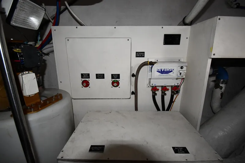  Yacht Photos Pics Engine room of 2005 Cruisers Yachts 500 Express with control panel and Reverso oil change system.