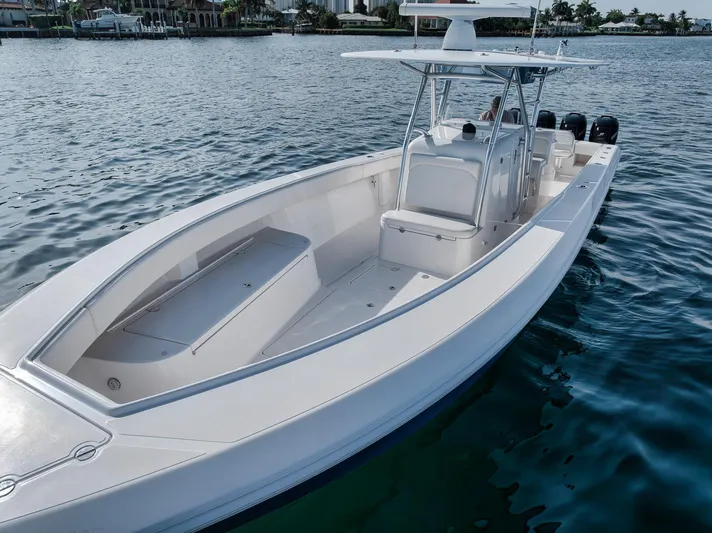  Yacht Photos Pics 2013 Bahama 41 boat on water, sleek design, spacious deck, triple outboard engines.