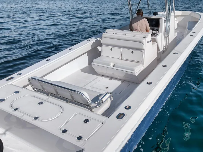  Yacht Photos Pics 2013 Bahama 41 boat on water, featuring spacious deck and seating.