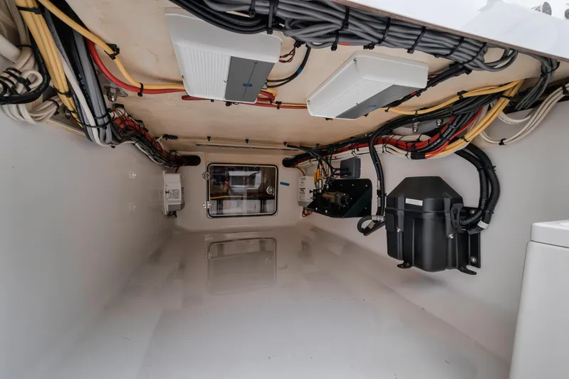  Yacht Photos Pics Interior view of a 2013 Bahama 41 boat's wiring and equipment compartment.