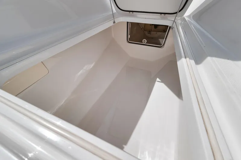  Yacht Photos Pics Spacious storage compartment in 2013 Bahama 41 boat, featuring clean white interior.