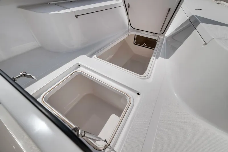  Yacht Photos Pics Open storage compartments on a 2013 Bahama 41 boat deck.