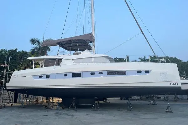 Morgan Blu Yacht Photos Pics 2021 Bali 5.4 catamaran on dry dock, showcasing sleek design and modern features.