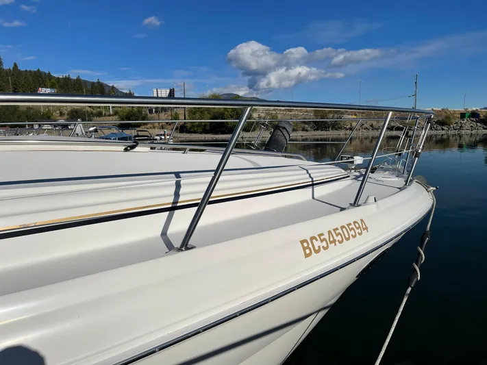  Yacht Photos Pics 2000 Sea Ray 380 Sundancer boat docked on a sunny day.