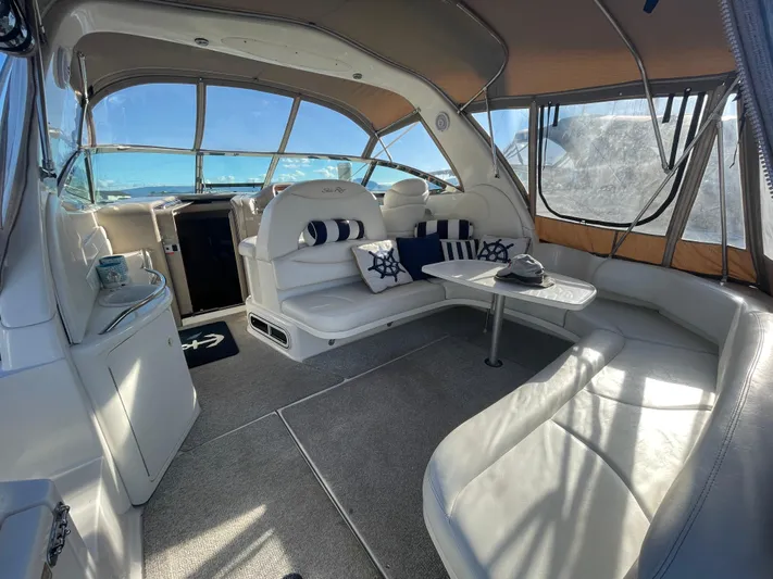  Yacht Photos Pics Interior of 2000 Sea Ray 380 Sundancer yacht with plush seating and nautical decor.