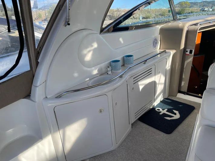  Yacht Photos Pics Interior of 2000 Sea Ray 380 Sundancer yacht with cabinets and nautical decor.