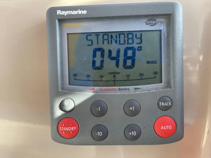  Yacht Photos Pics Raymarine autopilot display on 2000 Sea Ray 380 Sundancer, showing 048° in standby mode.